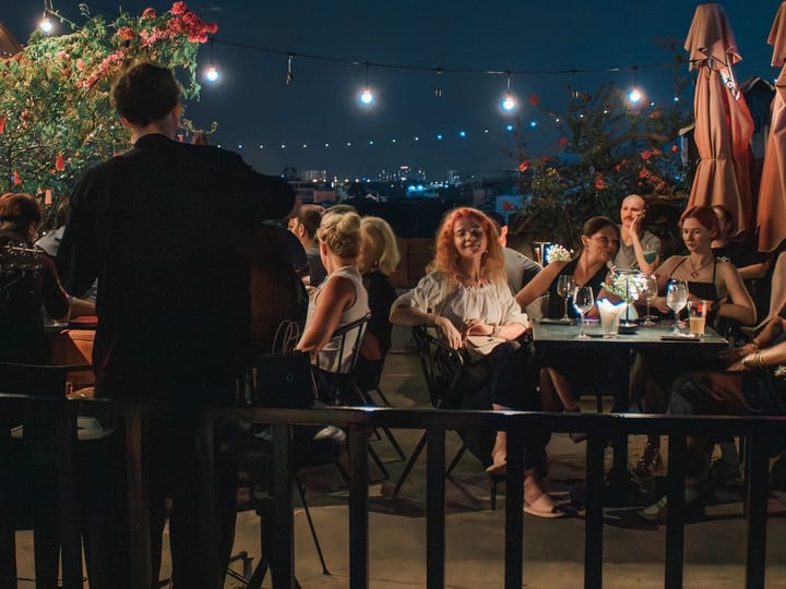 Luna & Co. rooftop in Thao Dien during an evening service